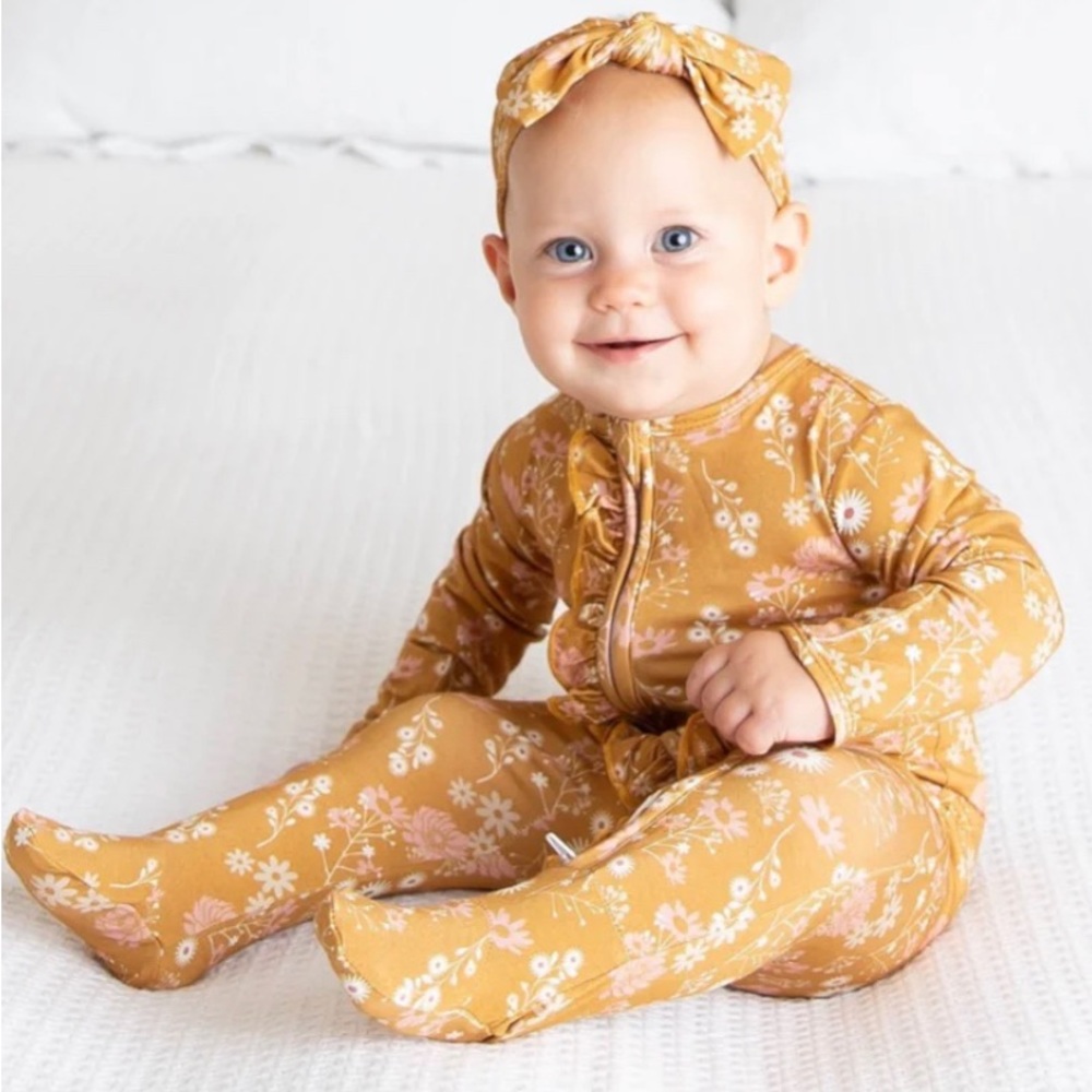 Bamboo ruffled footed romper for baby girl